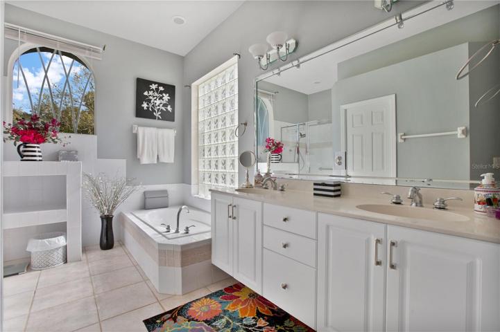 The primary suite bathroom with 2 vanities