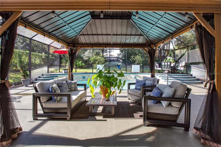 A cabana area next to the pool for additional entertaining and more!