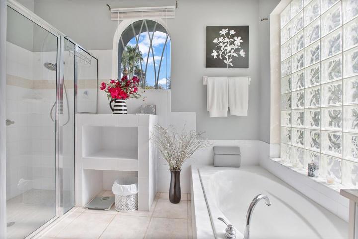 Primary suite bath with garden tub and separate shower