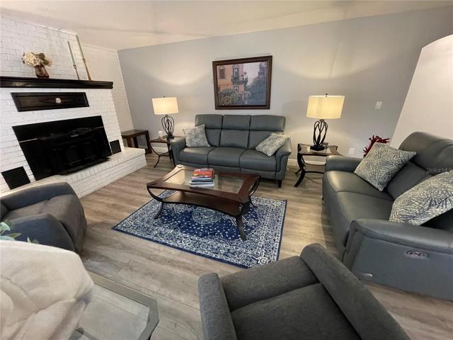 Living Room with Wood Burning Fireplace