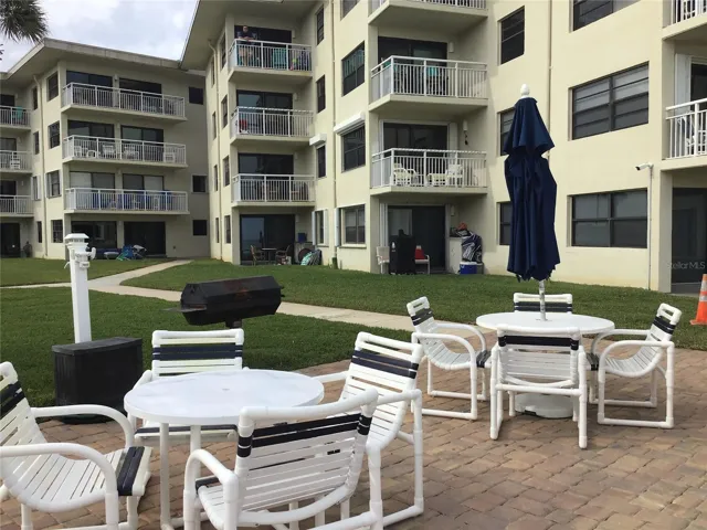BBQ AND DINING AREA AT POOL