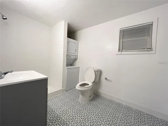 Unit #3 Bathroom with walk in Shower and Laundry