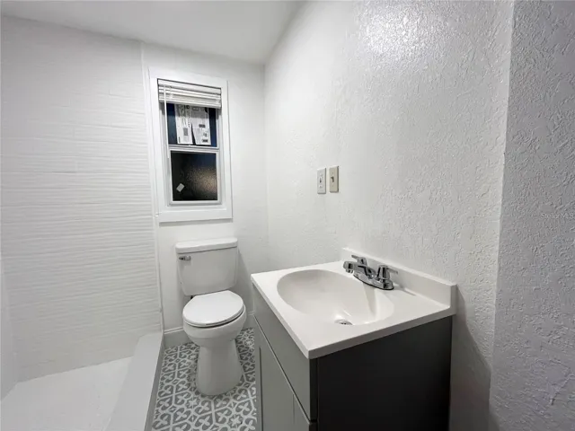 Unit #1 Remodeled Bath with Step in Shower
