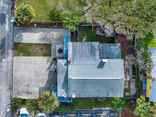 Unit 1 has a fenced side yard and Unit 2 has a deck with a fenced yard.