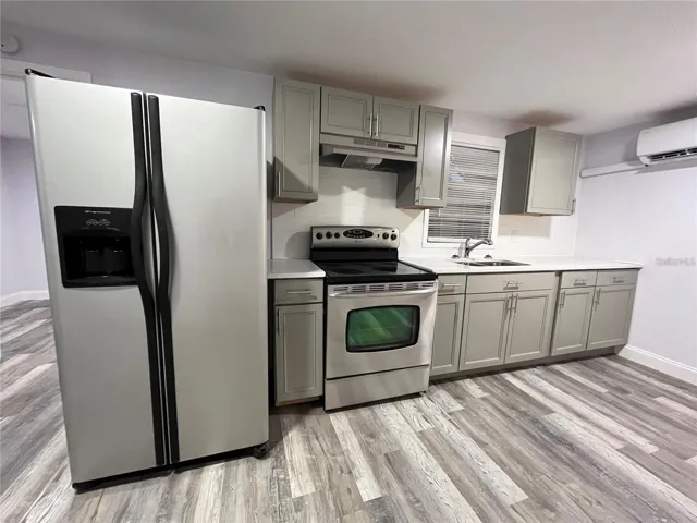 Unit#3 Beautiful Kitchen with window over sink.
