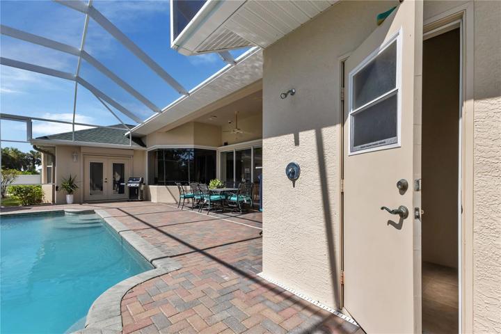 Door to pool bath from Lanai