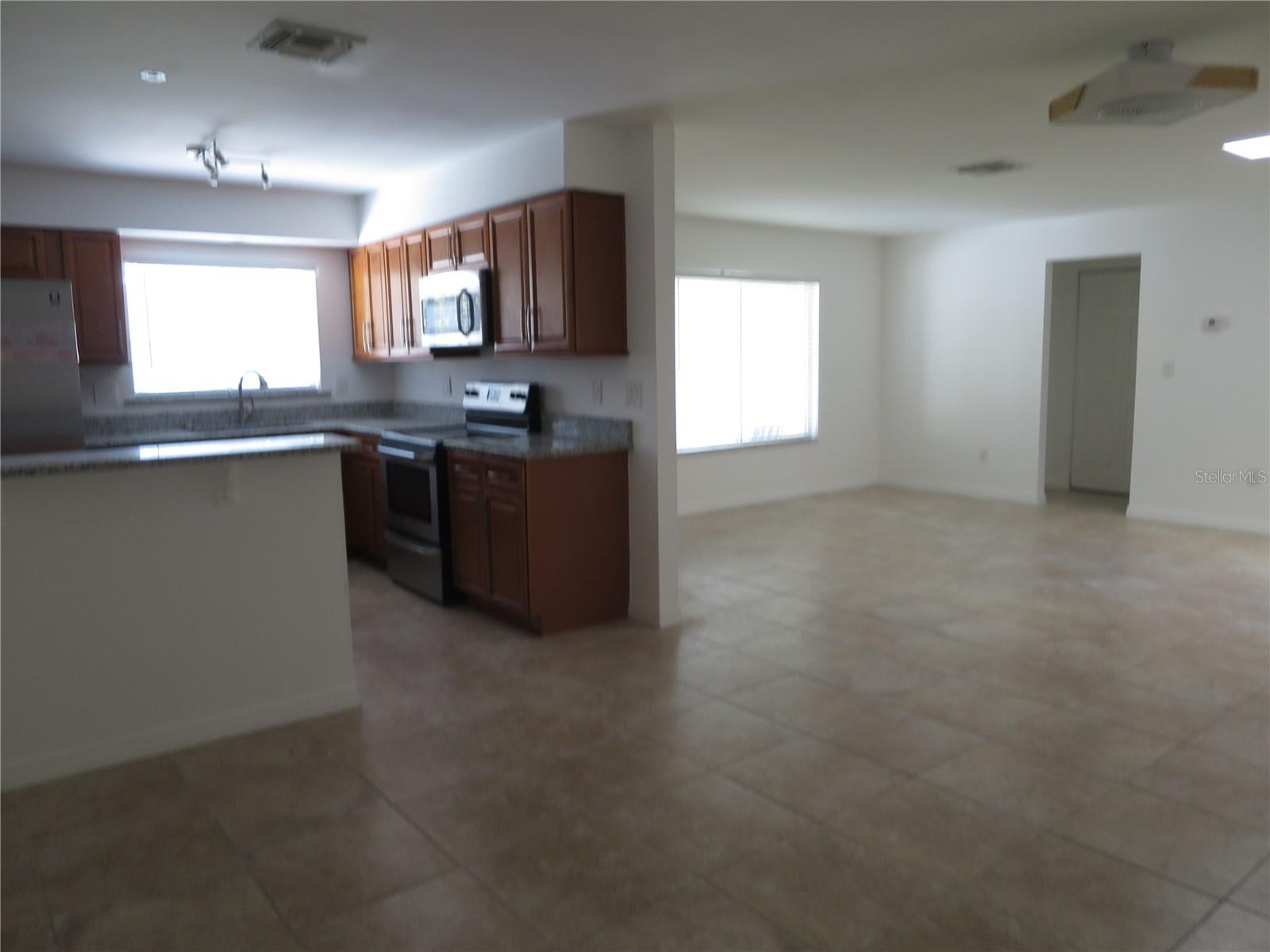 Kitchen next to Living Room