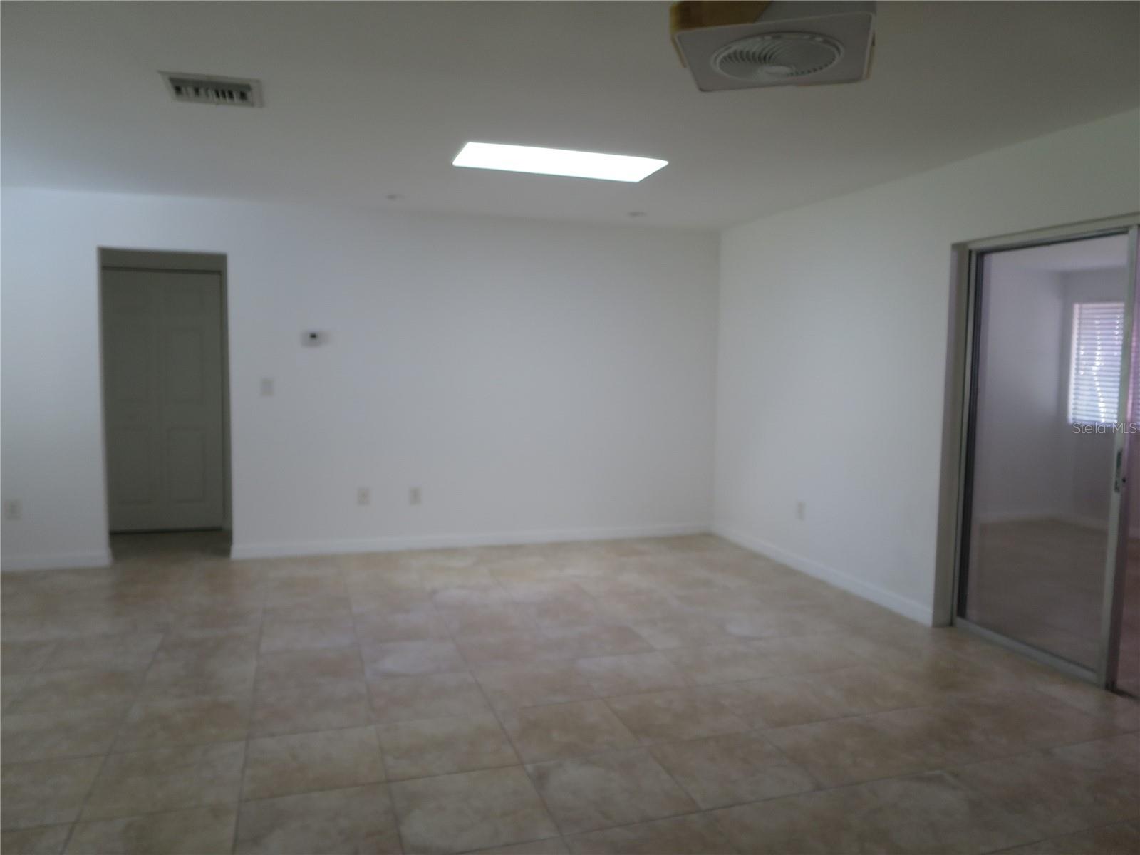 Living room corner leads to Bedrooms