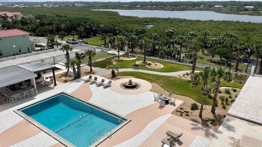 Pool area with nice Lounge area from Bedroom Balcony, Western View! You can see the Intracoastal Waterway too!
