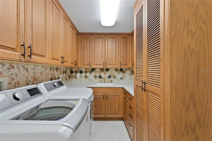 The spacious and organized laundry room