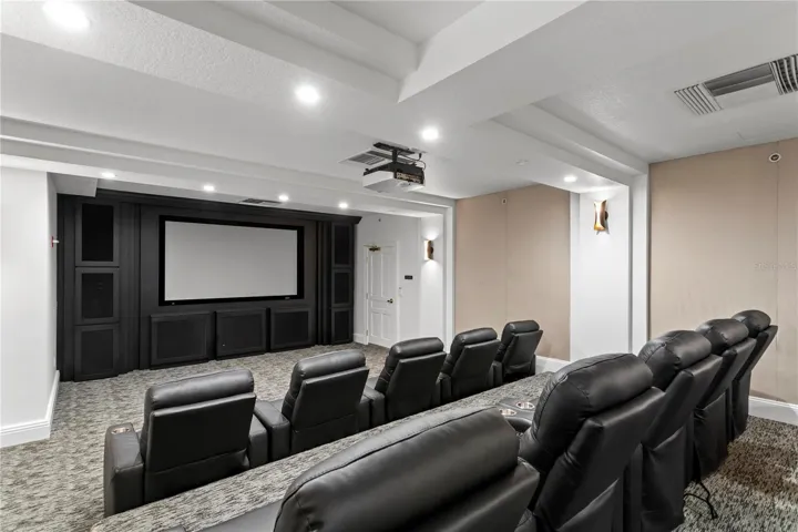 One of the many amenities include a theater room