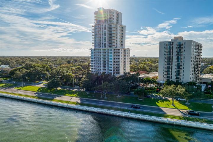 Located along the coveted Bayshore Blvd. with stunning views of the Bay and St. Pete to the southeast and Downtown Tampa to the north