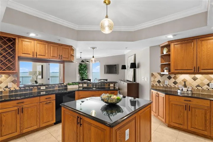 The spacious kitchen has an island with additional storage