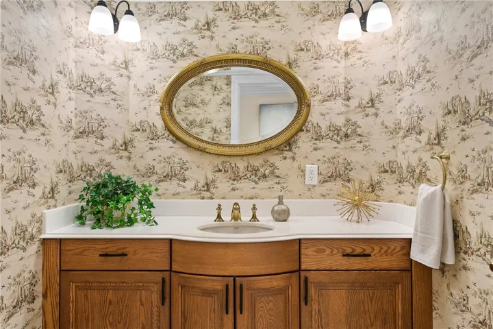 Half bath off of the entryway for guests