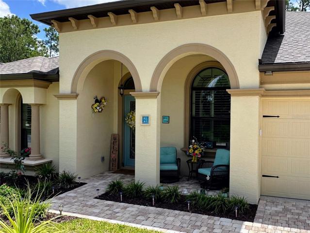 Step into elegance – a covered arched entryway that welcomes you with open arms. This charming architectural feature not only adds curb appeal but also sets the tone for the inviting ambiance that awaits inside. From the moment you cross the threshold, you'll be embraced by a sense of warmth and style that makes coming home a cherished experience.