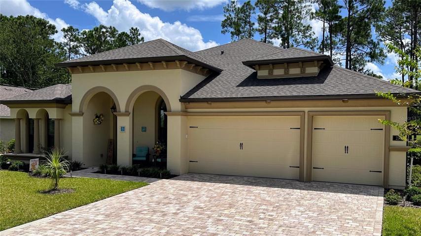 Appreciate the meticulous attention to detail – from arched windows to decorative banding, columns, garage hardware, soffit downlighting, and ornate accents. Witness the embodiment of beauty in every corner, as these carefully curated features come together to create an absolutely stunning curb appeal.