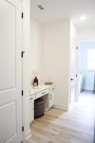 Built in tech desk and separate laundry room