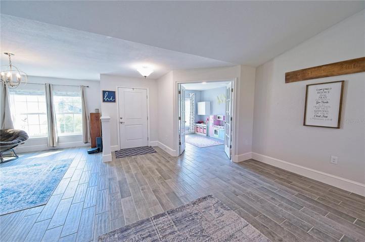 Livingroom with Cathedral Ceilings and Open Floor Plan.