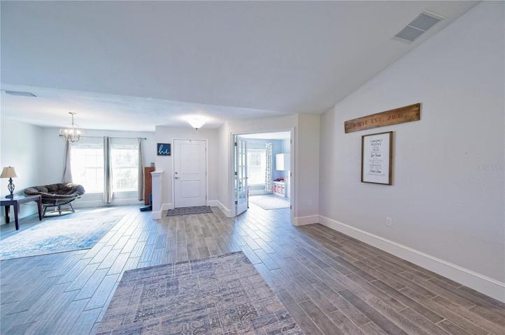 Open Living Floor Plan Plank Tile Floors