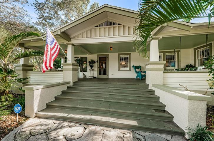 Historical charm meets modern updates in this 1918 home nestled on an oversized double lot.
