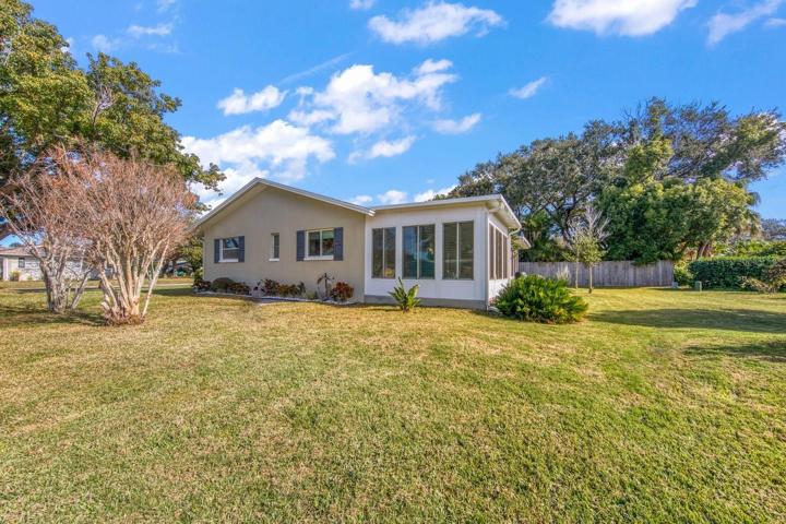 Corner lot with house well set back from road~