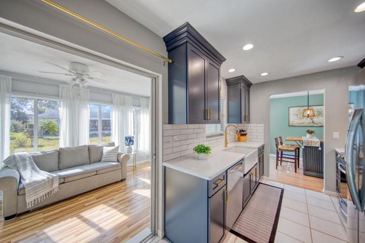 Opens to new sunroom with easy sliding windows~