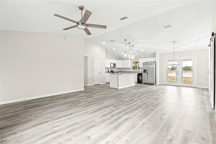 Living room with vaulted ceilings