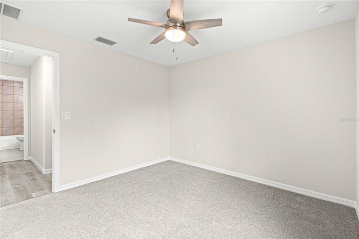 Bedroom 4 with full bathroom across the hall