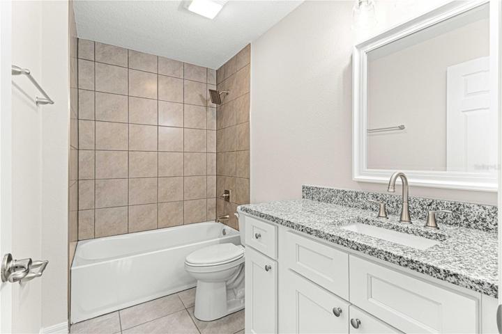 3rd full bathroom located across the hall from bedroom 4