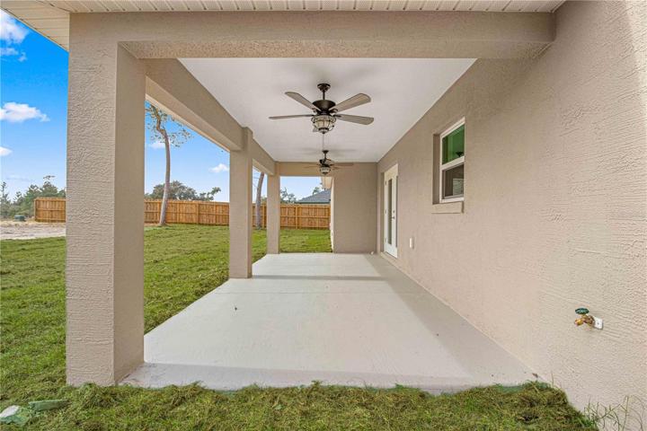 Oversized covered lanai with 2 ceiling fans