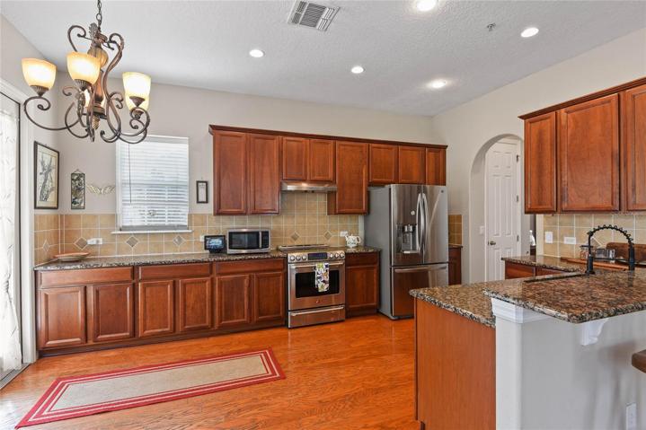 Stainless steel appliances and lots of cabinets