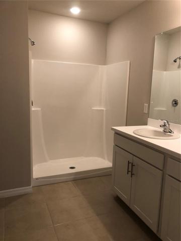 Walk in shower in owners suite