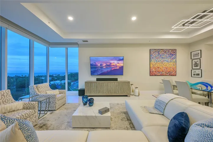 The Great Room boasts spacious, open-concept living areas with high ceilings.
