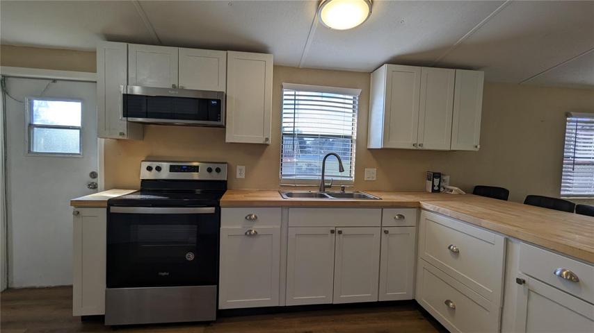 Rear Exit Door at Left of Kitchen