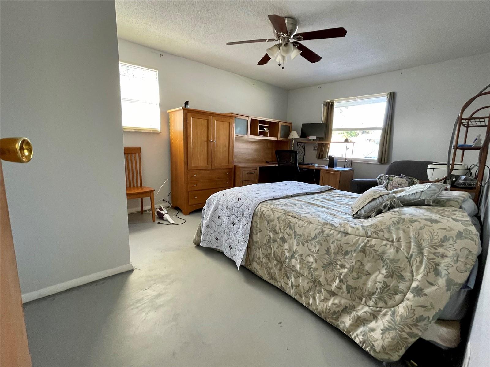 3rd bedroom right off the kitchen… The laundry/utility room is to the left