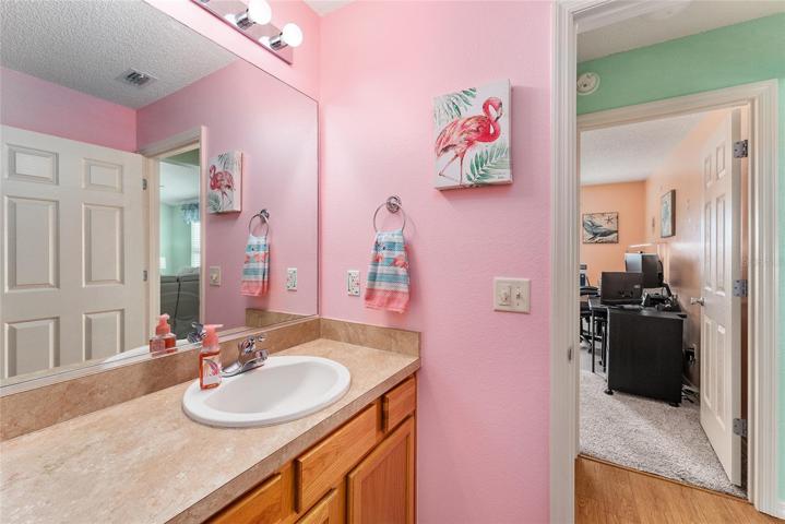 BATHROOM #2 - View of BR #2 (front of home) visible on R.