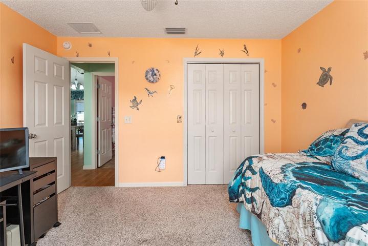 BEDROOM #2 - Entrance w/ open door leads to HALLWAY & BATHROOM #2