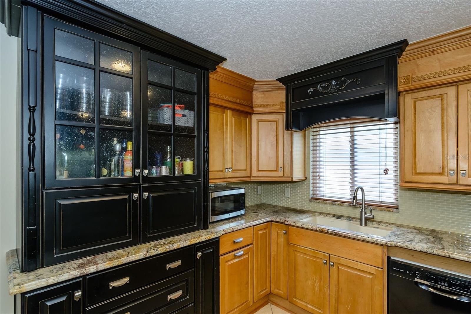 Glass cabinets can double as a display for your favorite china or glassware.