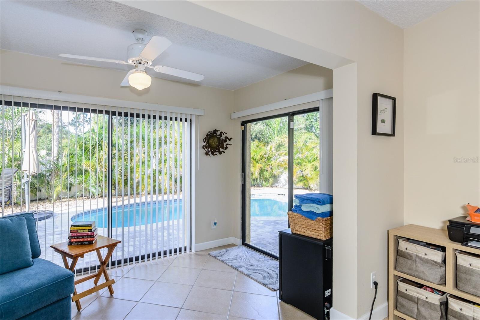 Relax with a good book in your sunny Florida room.