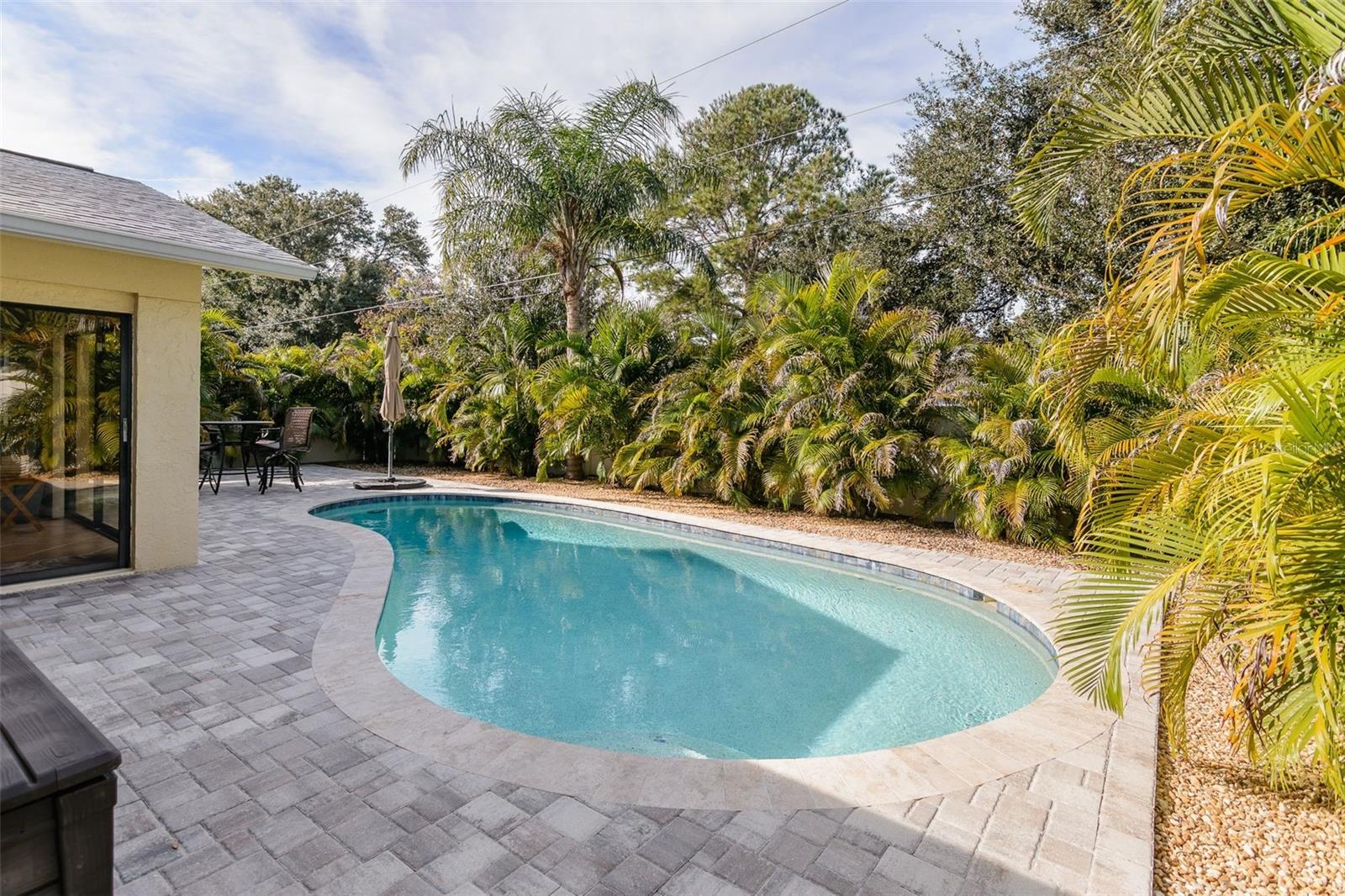 The pool is salt water and heated for year-round use.