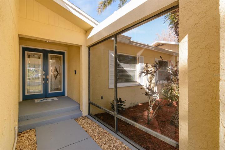 Enter through beautiful double glass doors.