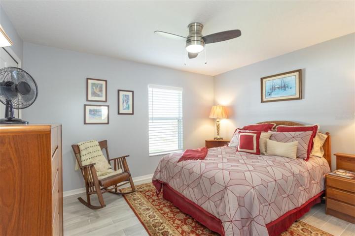 Lovely second bedroom with newly tiled floors