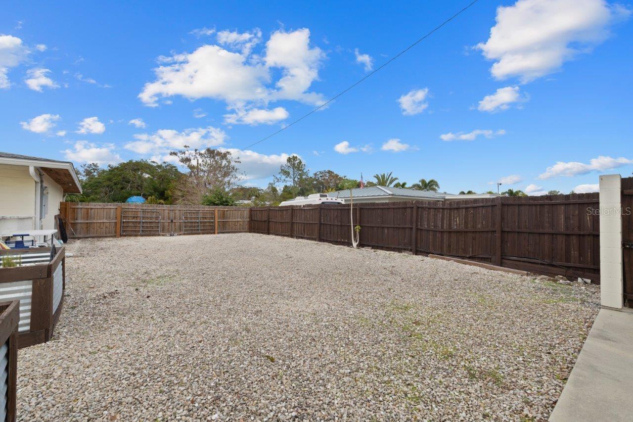 Spacious side yard perfect for parking an RV or boat!