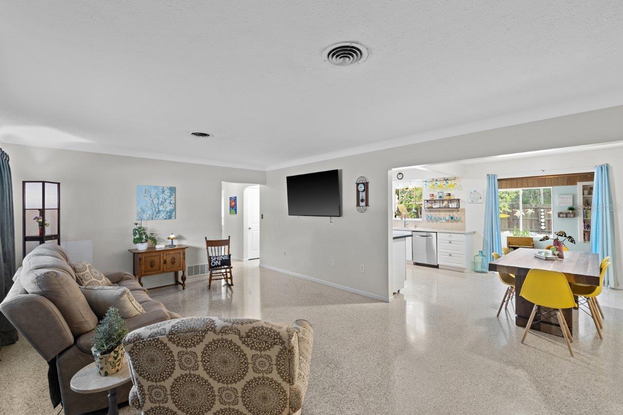 Living room featuring freshly polished terrazzo flooring.