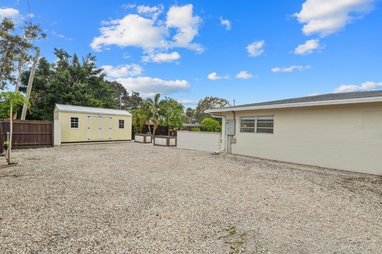 Spacious side yard perfect for parking an RV or boat!