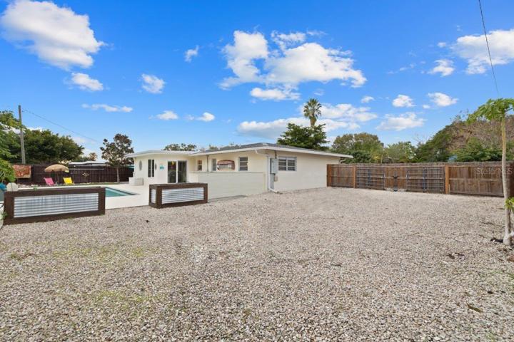 Spacious side yard perfect for parking an RV or boat!