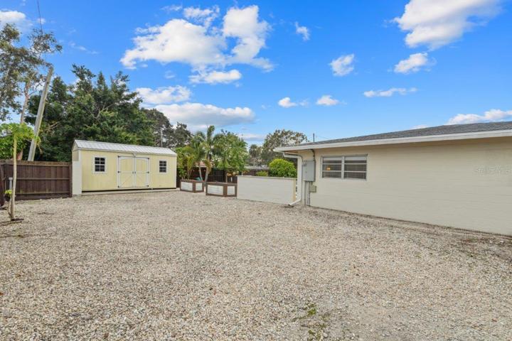 Spacious side yard perfect for parking an RV or boat!