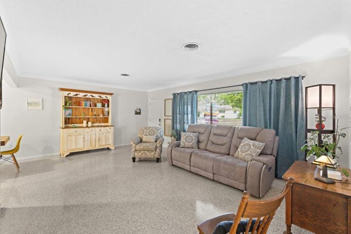 Living room featuring freshly polished terrazzo flooring.