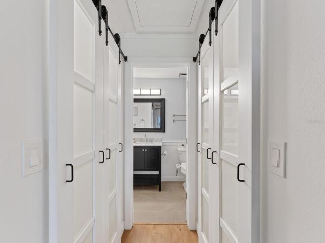 Primary Bedroom with His and Hers Closets