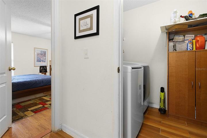 View of Master Bedroom and laundry room